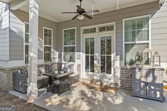 view of patio with french doors and a ceiling fan