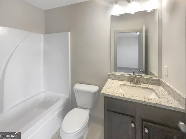 full bathroom featuring bathing tub / shower combination, baseboards, toilet, and vanity