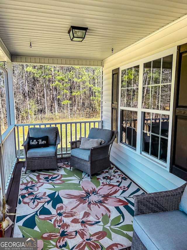 deck featuring covered porch