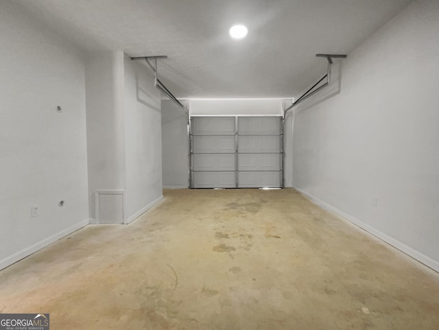 garage featuring baseboards