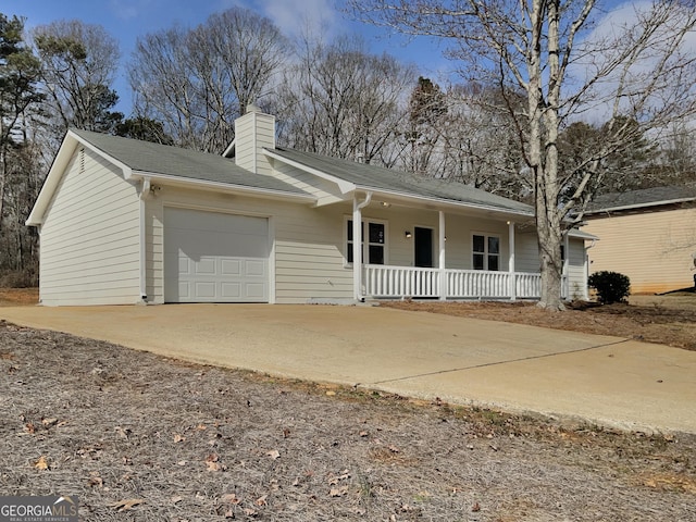 ranch-style home featuring a chimney, covered porch, driveway, and an attached garage