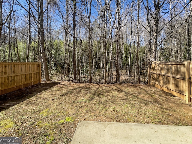 view of yard with fence