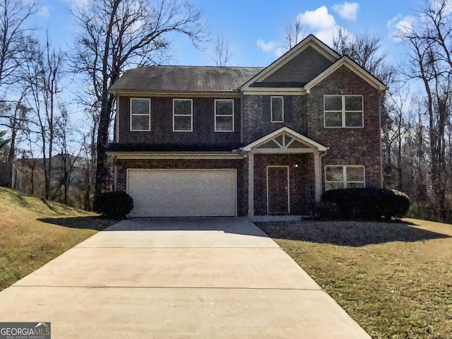 view of front of property featuring a garage, brick siding, and driveway