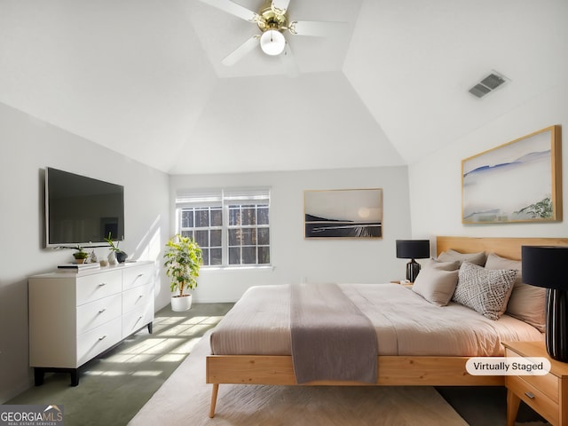 bedroom with visible vents, high vaulted ceiling, and a ceiling fan