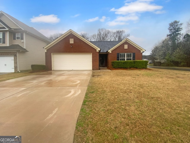 view of front of house featuring brick siding, an attached garage, concrete driveway, and a front lawn