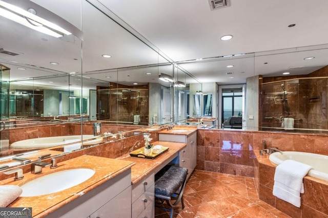 full bathroom with a bath, visible vents, and a stall shower