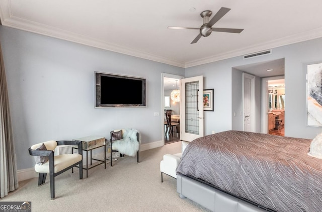 bedroom with visible vents, carpet, and ornamental molding