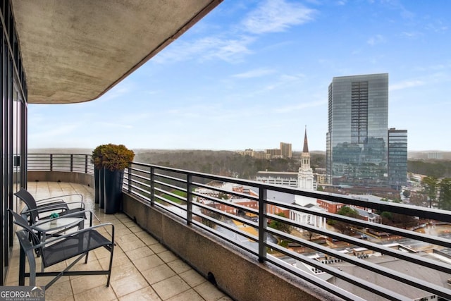 balcony featuring a view of city