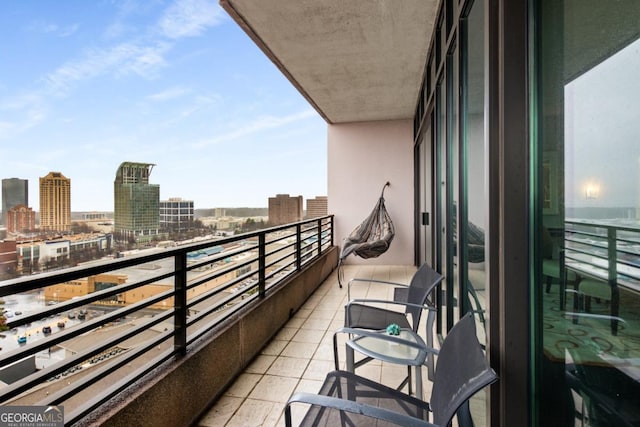 balcony featuring a view of city