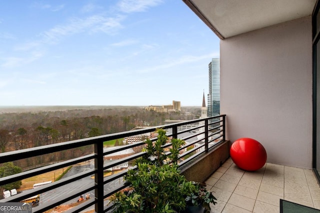 balcony featuring a city view