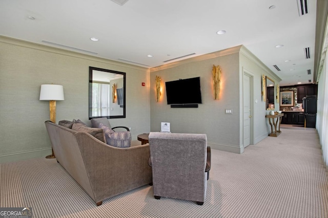 living room featuring recessed lighting, baseboards, light colored carpet, and crown molding