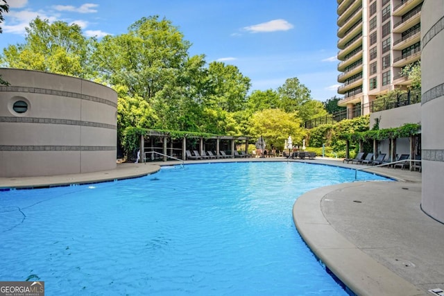 pool with a patio