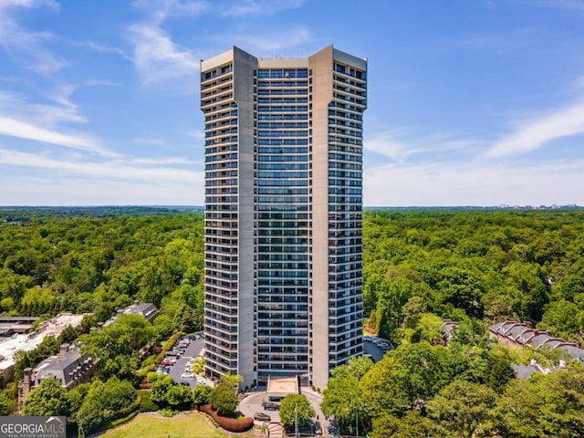 2660 Peachtree Rd NW Unit 14D, Atlanta, GA 30305 - view of building exterior with a view of trees