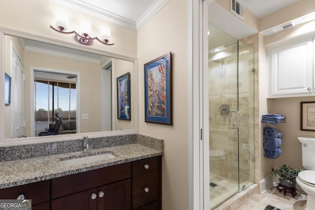 bathroom with a stall shower, toilet, crown molding, and vanity