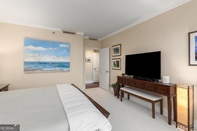 carpeted bedroom with visible vents and ornamental molding