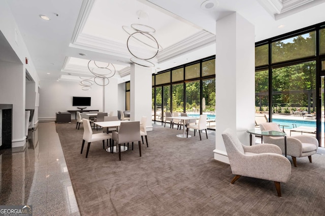 2660 Peachtree Rd NW Unit 14D, Atlanta, GA 30305 - dining area featuring ornamental molding, a tray ceiling, a high ceiling, and recessed lighting
