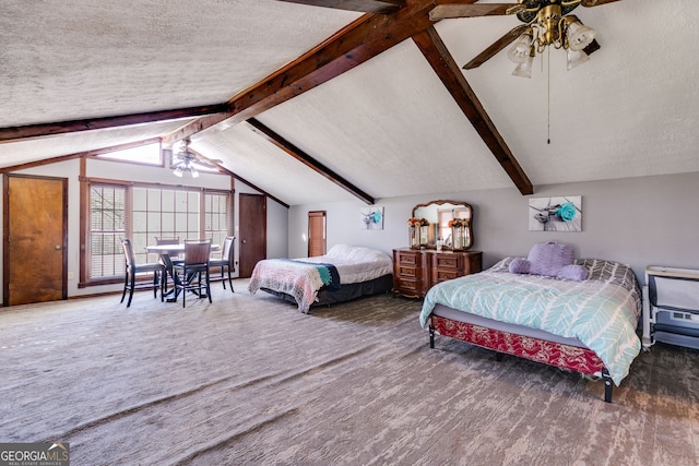 bedroom with lofted ceiling with beams, a ceiling fan, and a textured ceiling