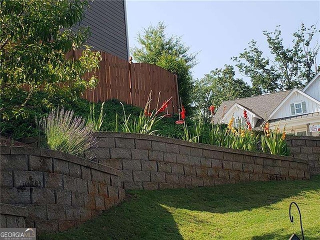 view of yard with fence