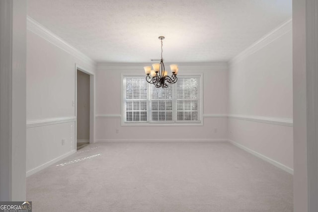 unfurnished dining area with baseboards, carpet floors, an inviting chandelier, and ornamental molding