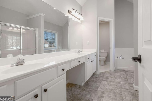 full bath with vaulted ceiling, toilet, double vanity, and a sink