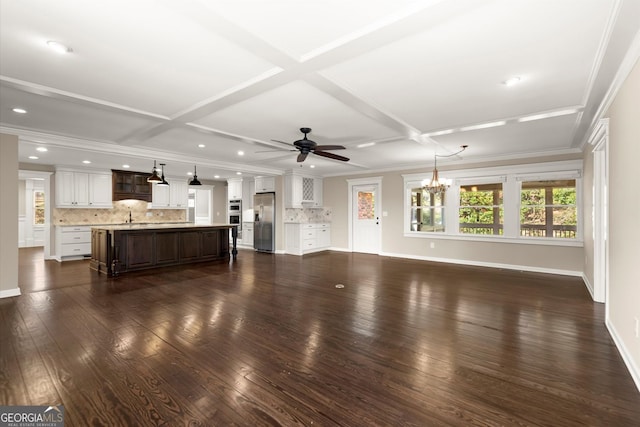 unfurnished living room featuring coffered ceiling, crown molding, baseboards, and dark wood-style flooring