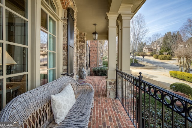 balcony featuring covered porch