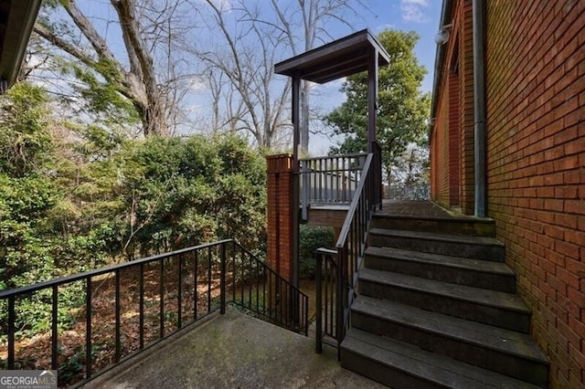 balcony featuring stairway