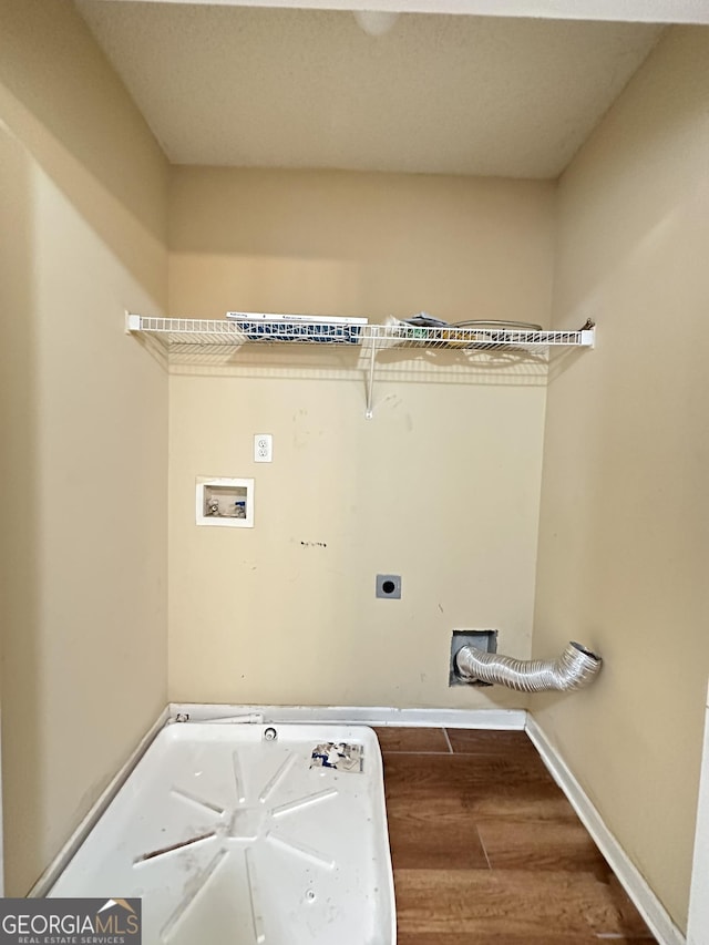 laundry area featuring wood finished floors, baseboards, hookup for an electric dryer, laundry area, and washer hookup