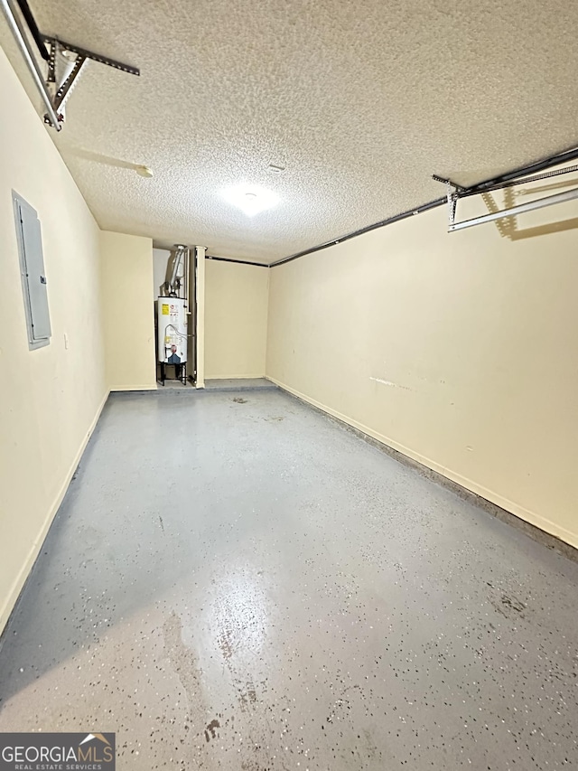 garage with electric panel, water heater, and baseboards