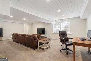 carpeted home office featuring recessed lighting