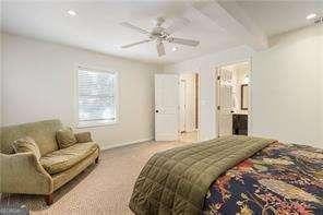 bedroom with carpet floors and ceiling fan