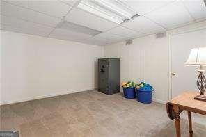 basement with a drop ceiling