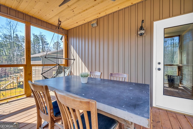 deck featuring outdoor dining area