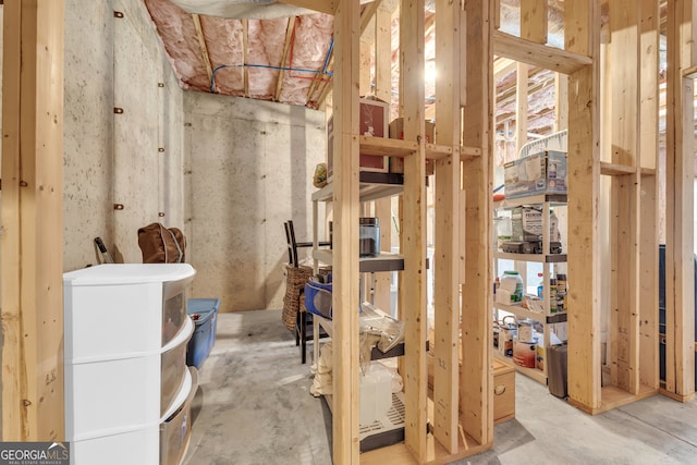 bathroom with unfinished concrete flooring