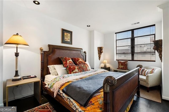 bedroom featuring recessed lighting, visible vents, and dark wood-style flooring