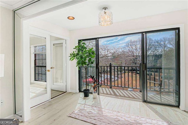 interior space with wood finished floors and a wealth of natural light