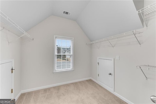 1900 Sanborne Way, Dacula, GA 30019 - walk in closet featuring carpet flooring and lofted ceiling