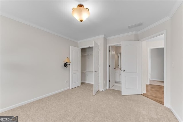 1900 Sanborne Way, Dacula, GA 30019 - unfurnished bedroom with light carpet, crown molding, a closet, and baseboards
