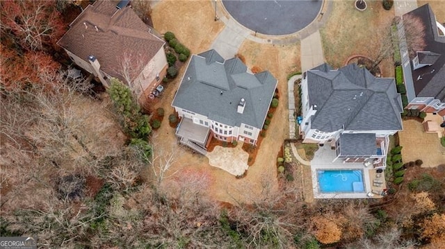 1900 Sanborne Way, Dacula, GA 30019 - aerial view of property and surrounding area featuring a pool area and nearby suburban area