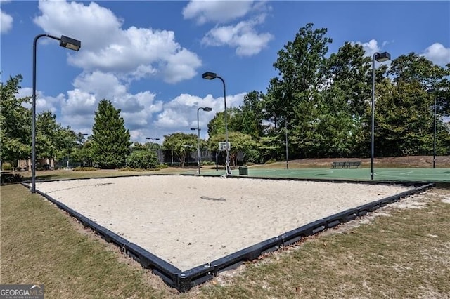 view of community featuring community basketball court