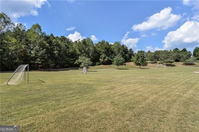 1900 Sanborne Way, Dacula, GA 30019 - view of yard featuring an area for sports and view of wooded area