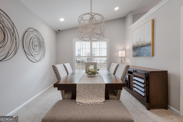 dining room featuring a chandelier, recessed lighting, light colored carpet, and baseboards