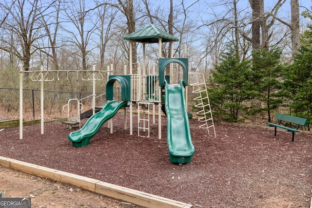 community jungle gym with fence