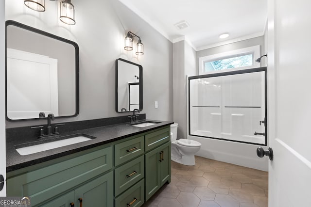 bathroom featuring a sink, visible vents, toilet, and tile patterned flooring