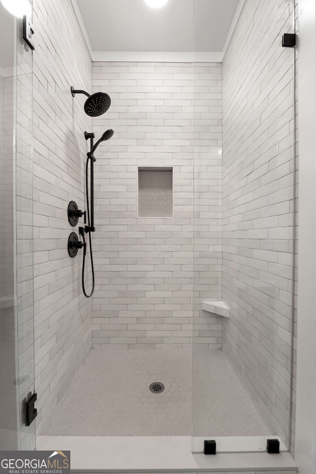 bathroom featuring a stall shower