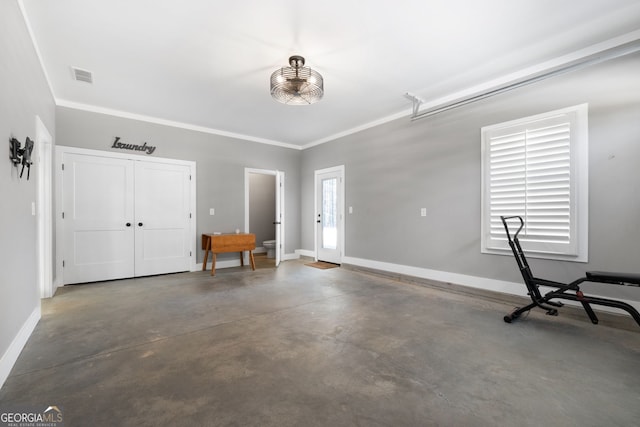 garage with visible vents and baseboards