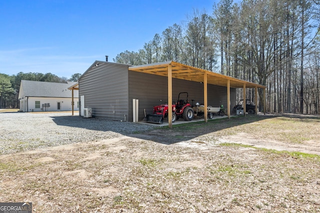 view of pole building with a carport