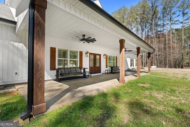 view of patio with a ceiling fan and french doors