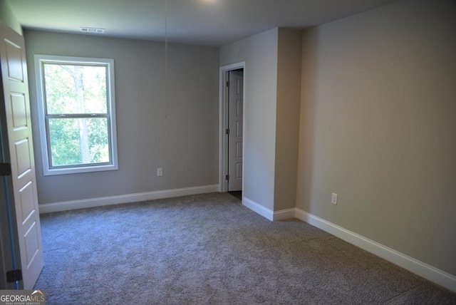 480 Brown Dove Ln, Grayson, GA 30017 - empty room with carpet, visible vents, and baseboards