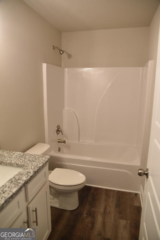480 Brown Dove Ln, Grayson, GA 30017 - full bath featuring vanity, toilet, wood finished floors, and shower / bathtub combination